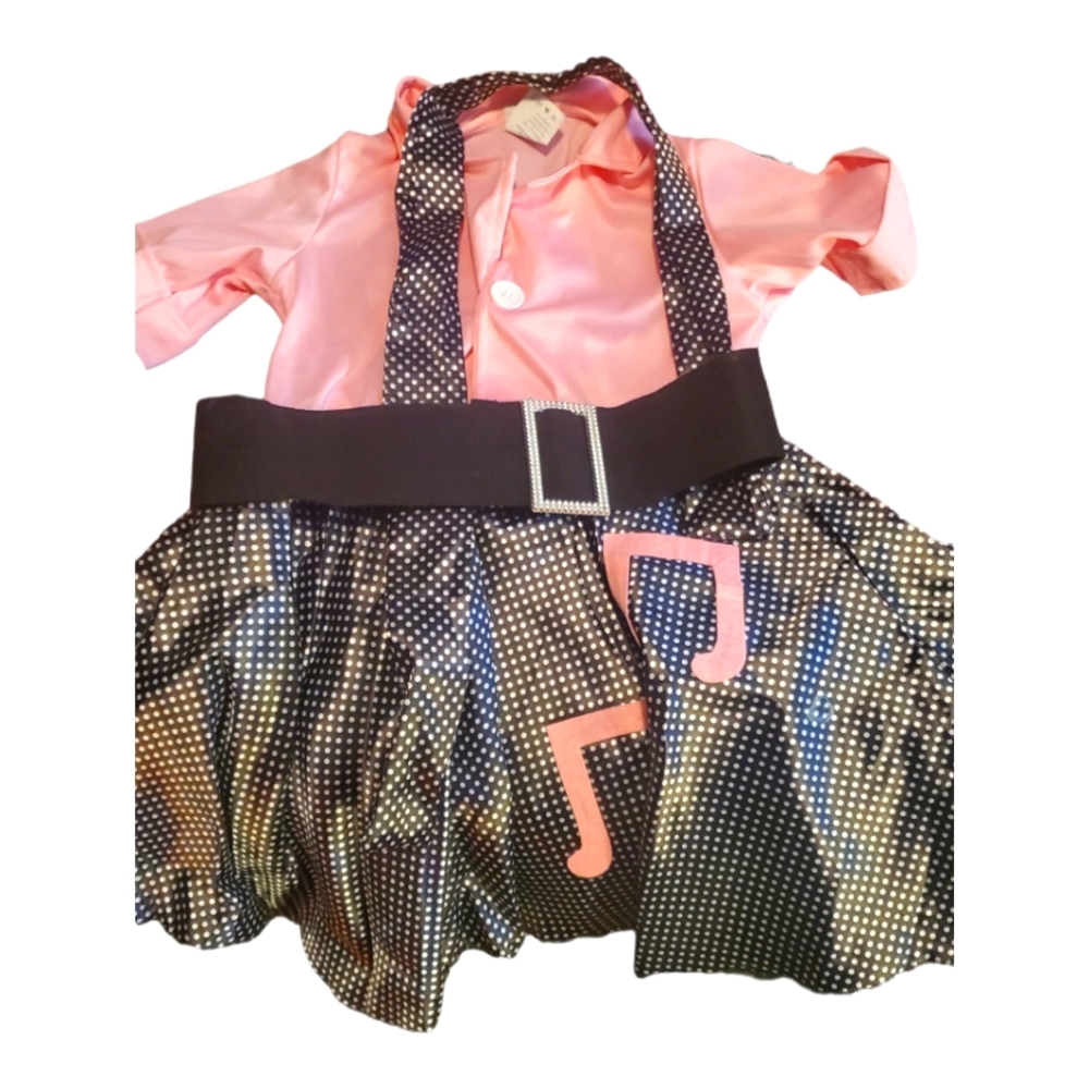 PINK AND BLACK SOCK HOP DRESS FOR CHILD 7-9. NEW IN PACKAGE BUT LOST THE INSERT